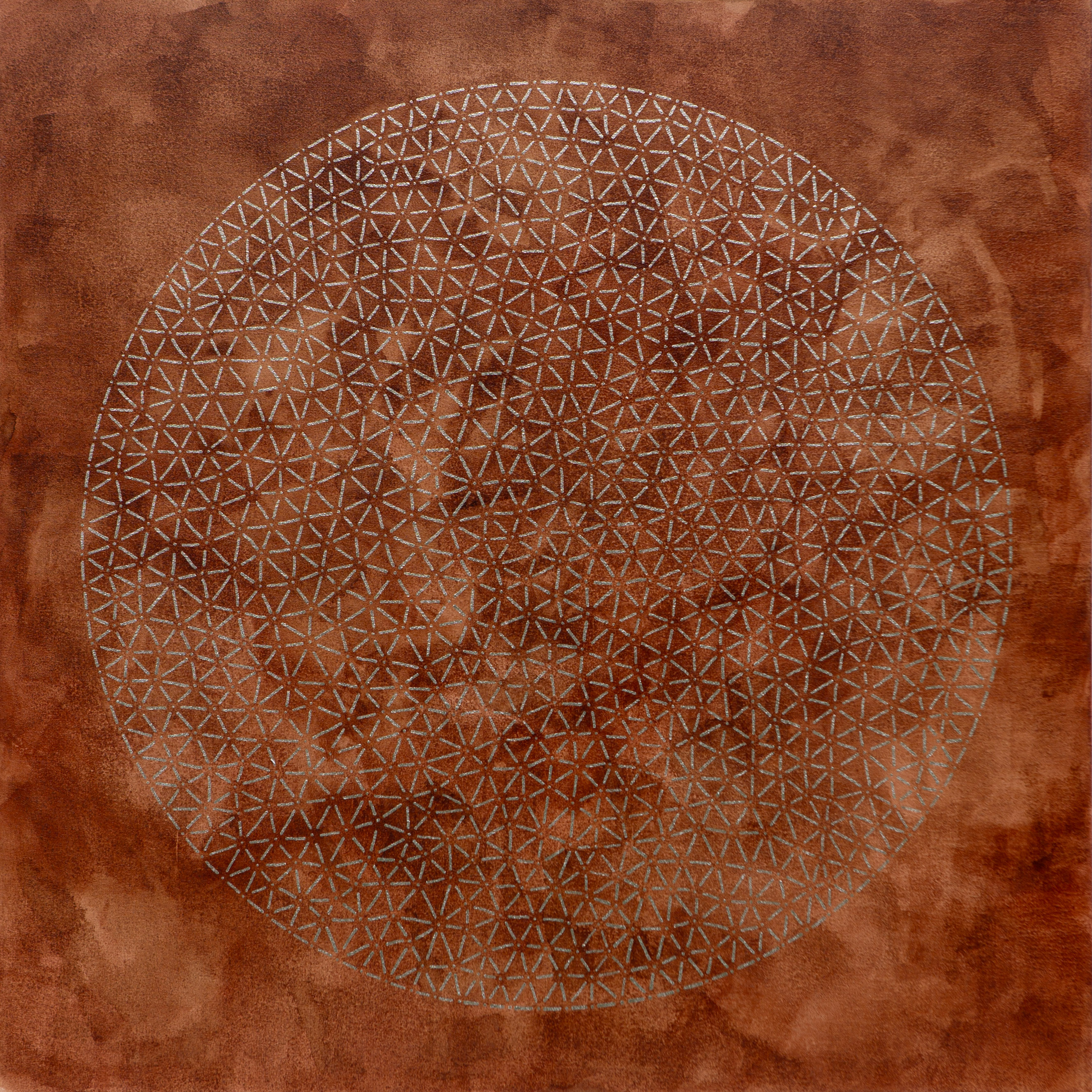 Fine golden marks form a circular pattern on a mottled rust-brown square.