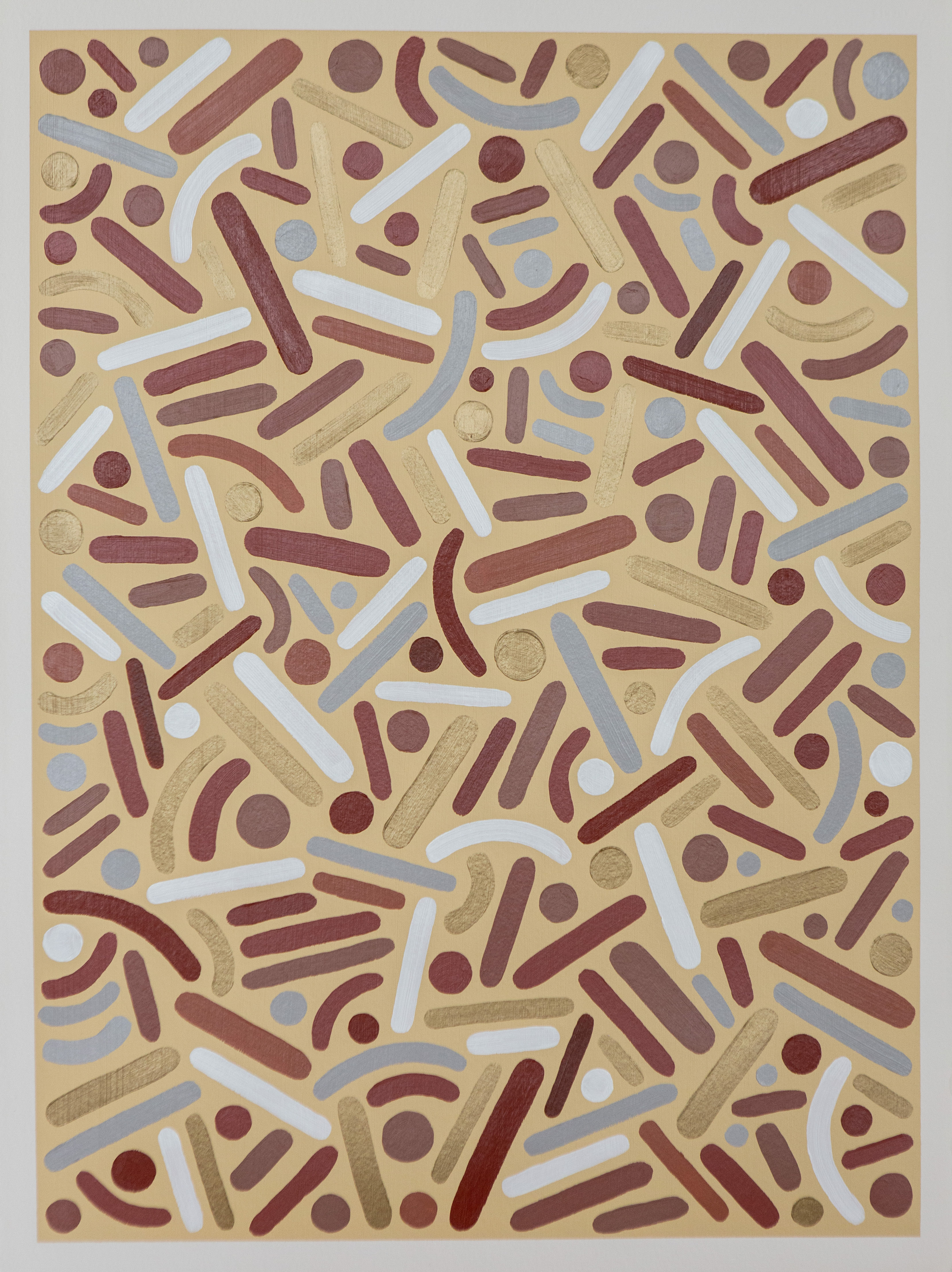 Brown and cream dots, curves, and straight lines arranged over a light rectangular background.