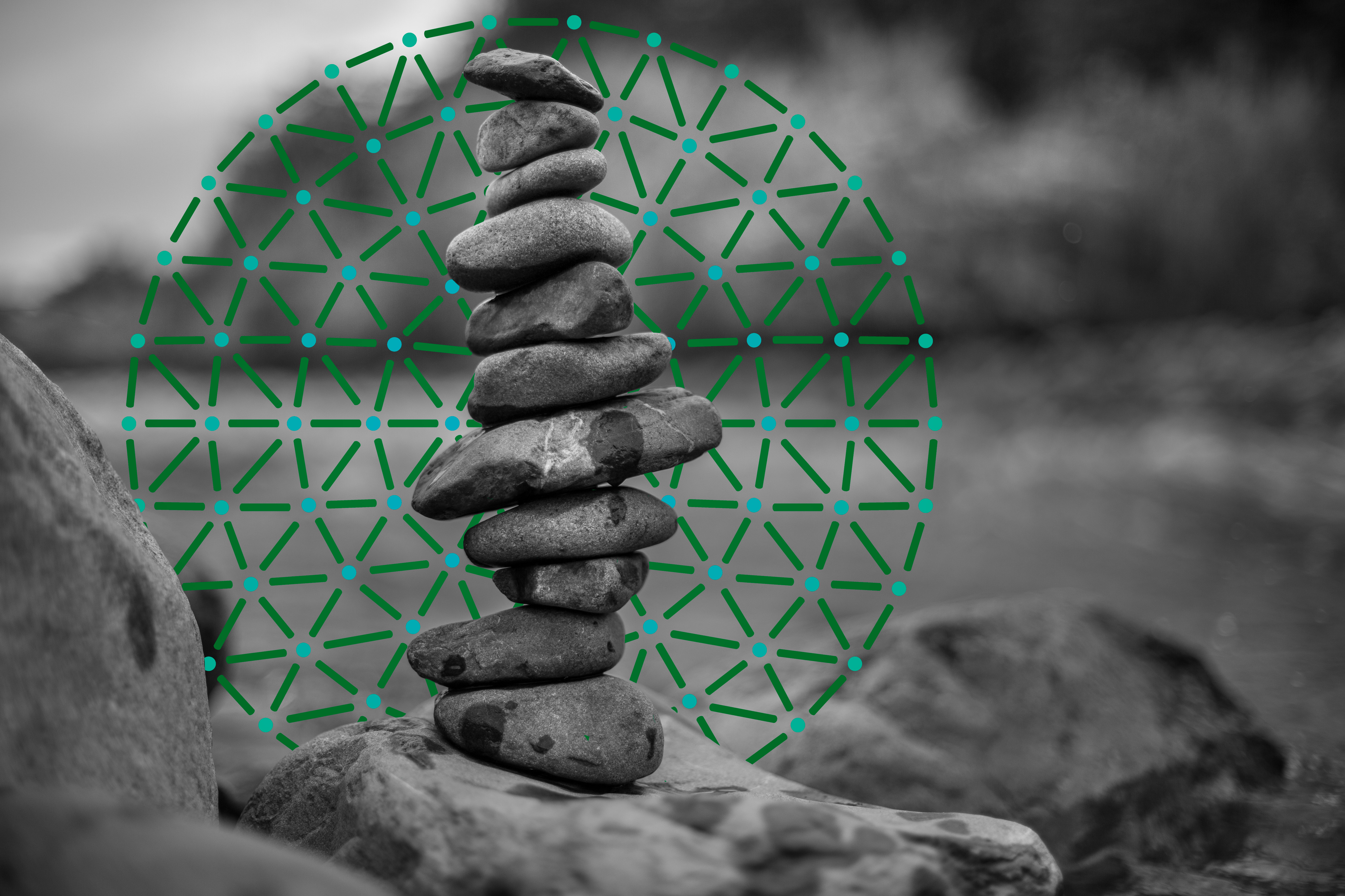“Equilibrium Field” by Pipe Yanguas, depicting a delicate stack of balanced stones against a circular green geometric network of dots and lines in a black-and-white landscape.