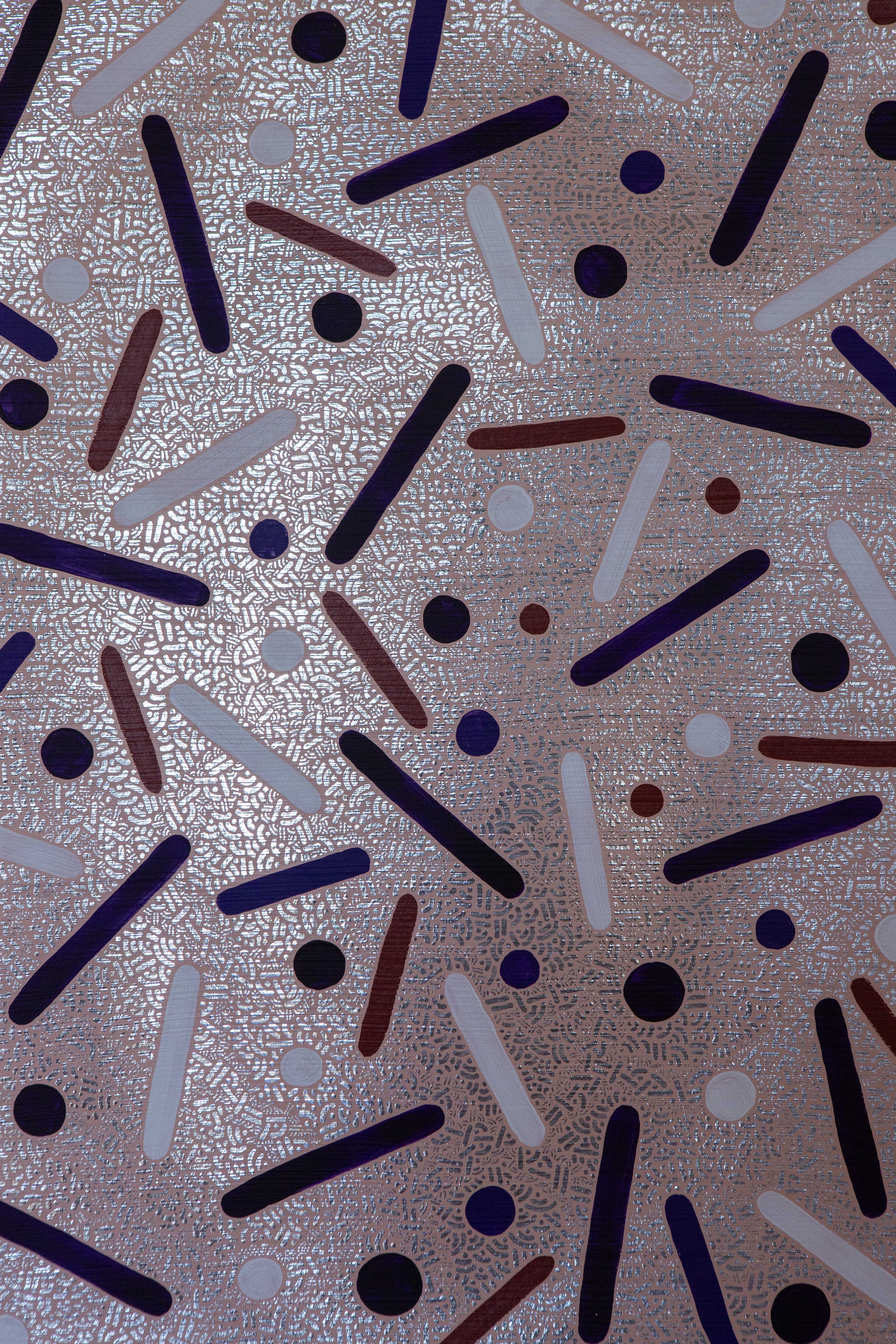 Detail of Desert Bloom by Pipe Yanguas, showing indigo and earthy red dots, elongated white lines and fine silver patterns.